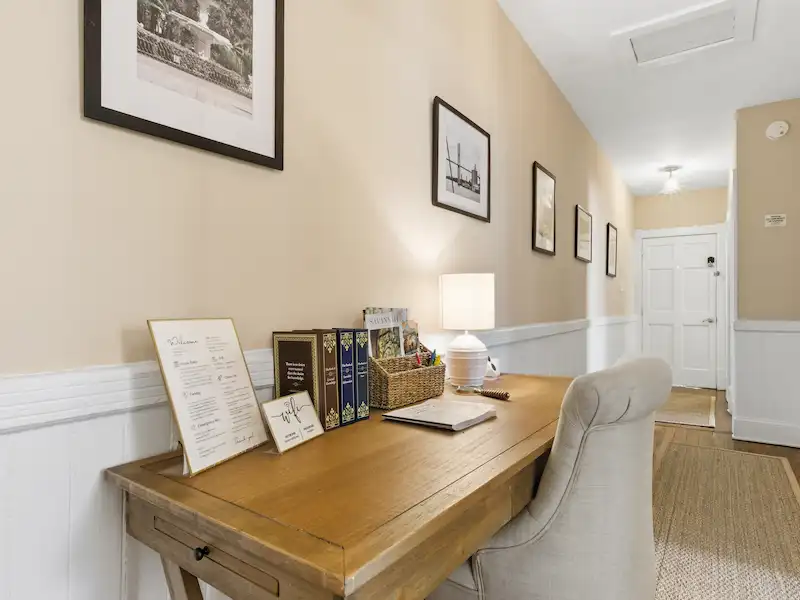 Suite 316A bathroom with haint blue shiplap and subway tile — Victorian District Savannah vacation rental