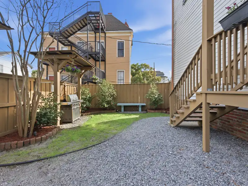 Suite 316A private deck — morning coffee spot at Victorian District vacation rental Savannah