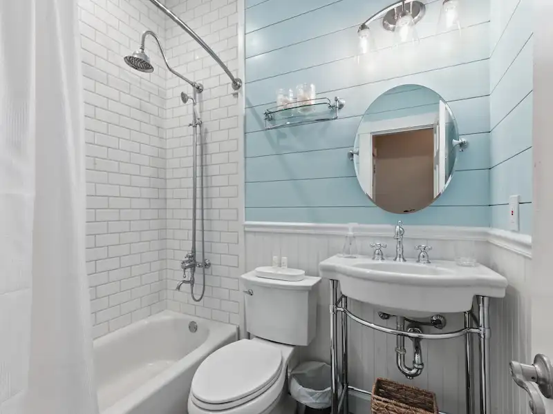 Suite 316A king bedroom with smart TV and dresser — Victorian District vacation rental Savannah